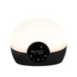 Lumie Bodyclock Glow, en kupolformad väckningslampa med svart högtalarsockel och display på 07:00, fotad mot vit bakgrund