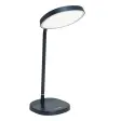 Lumie Task i mörkgrå/blå, en skrivbordslampa med böjd arm och rund lampskärm, fotad mot vit bakgrund