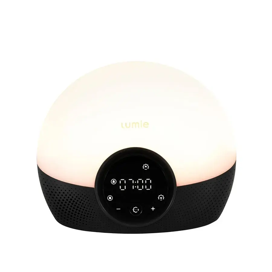 Lumie Bodyclock Glow, en kupolformad väckningslampa med svart högtalarsockel och display på 07:00, fotad mot vit bakgrund